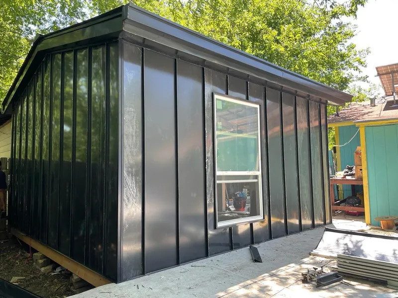 Black standing seam metal wall panels for Roof Inspection in Tehaleh