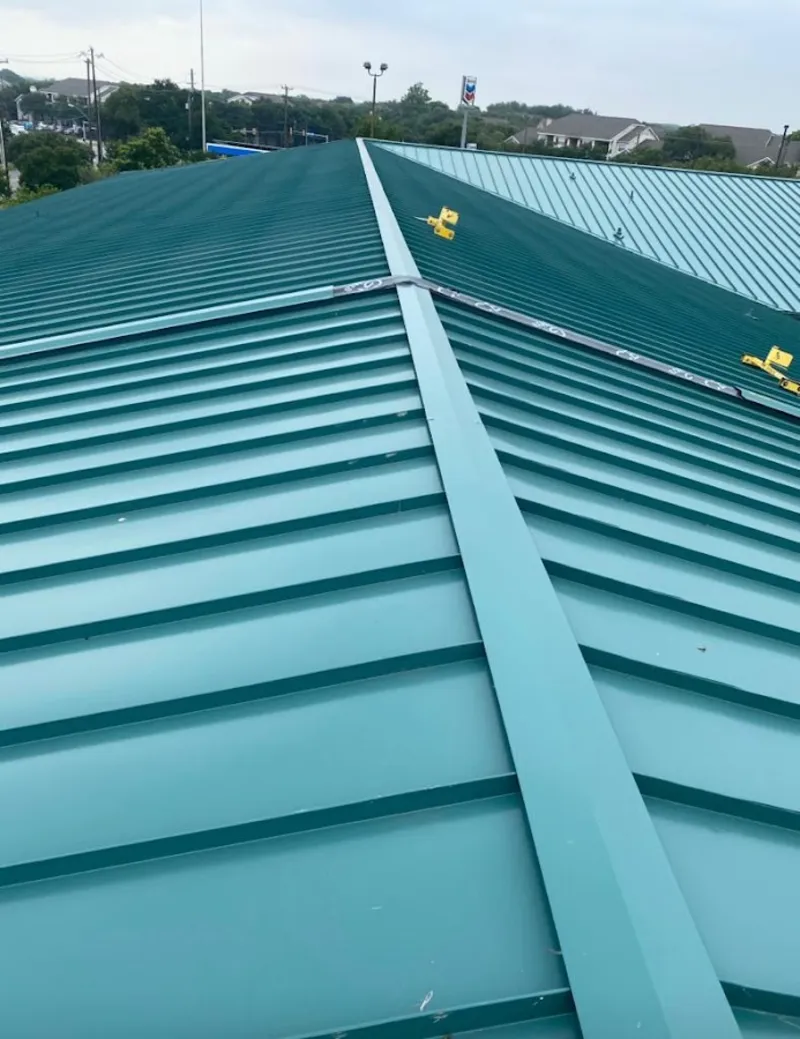 Green commercial metal roof ridge and valley for Metal Roof Repair in Tehaleh